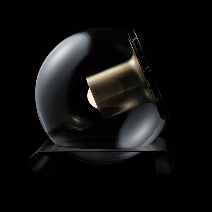 The Globe Table Lamp in Satin Gold/Anodic Bronze.