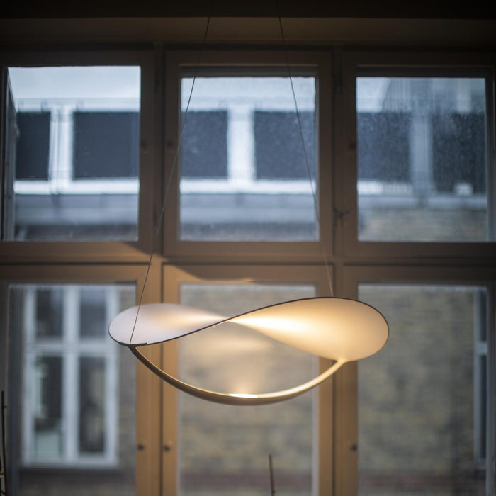 Plena LED Pendant Light in living room.