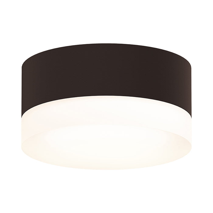 Reals Outdoor LED Flush Mount Ceiling Light in Textured Bronze/White Cylinder Lens.