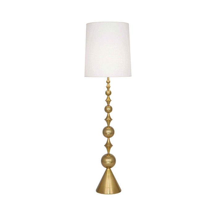 Harlequin Floor Lamp in Antique Brass.