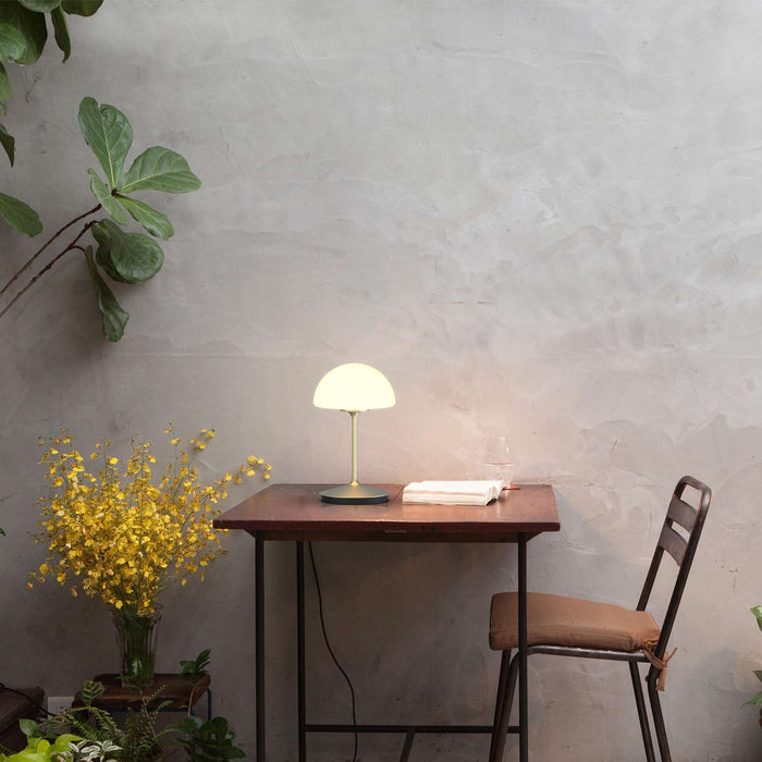 Pensee LED Table Lamp in Outside Area.