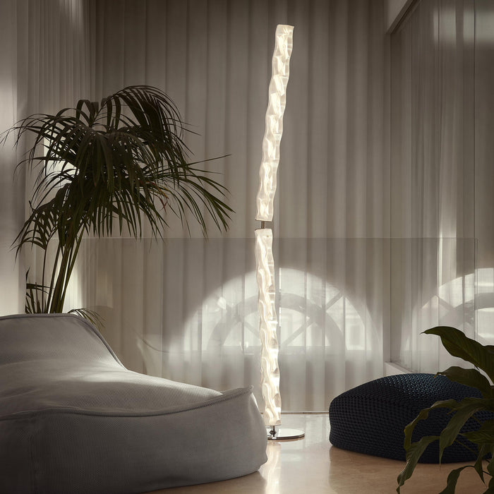 Hugo LED Floor Lamp in bedroom.