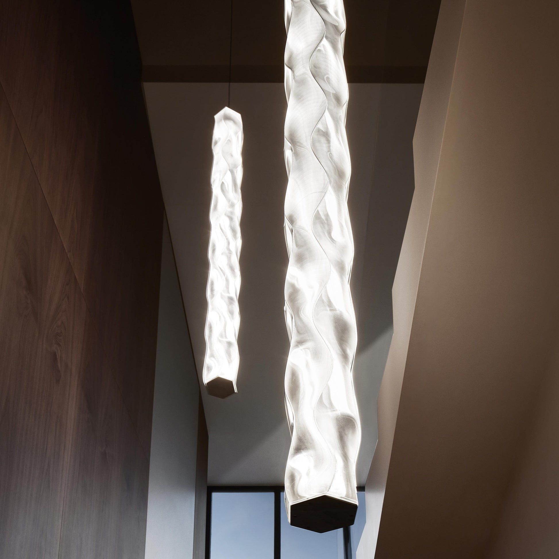 Hugo Vertical LED Pendant Light in living room.