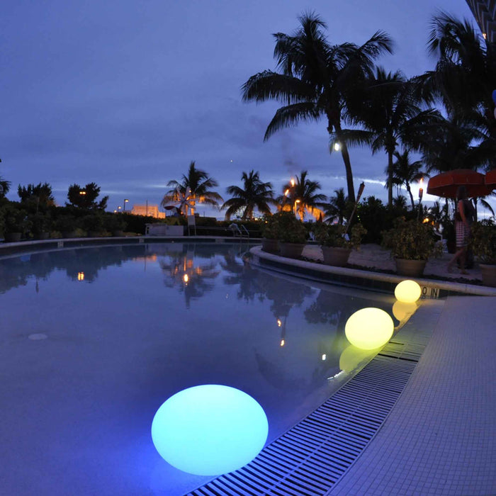 Flatball Floating Bluetooth Outdoor LED Lamp in Outside Area.