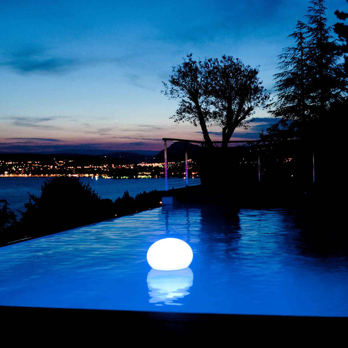 Flatball Floating Bluetooth Outdoor LED Lamp in Outside Area.