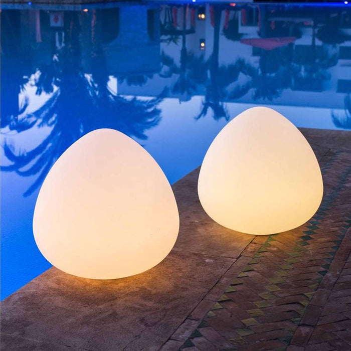 Rock Bluetooth Outdoor LED Table Lamp in Outside Area.