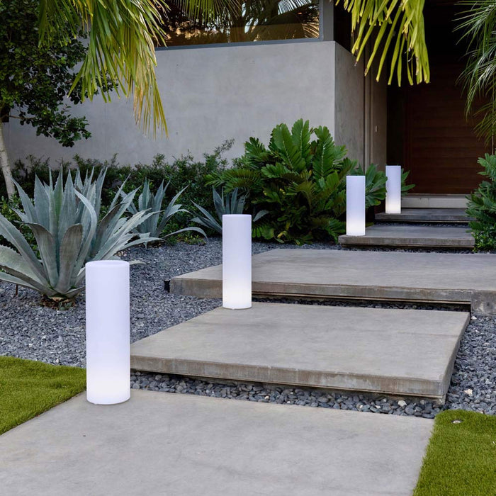 Tower LED Floor Lamp in Outside area.