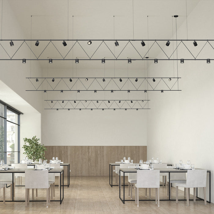 Suspenders® Flat Truss Linear LED Suspension Light in dining room.