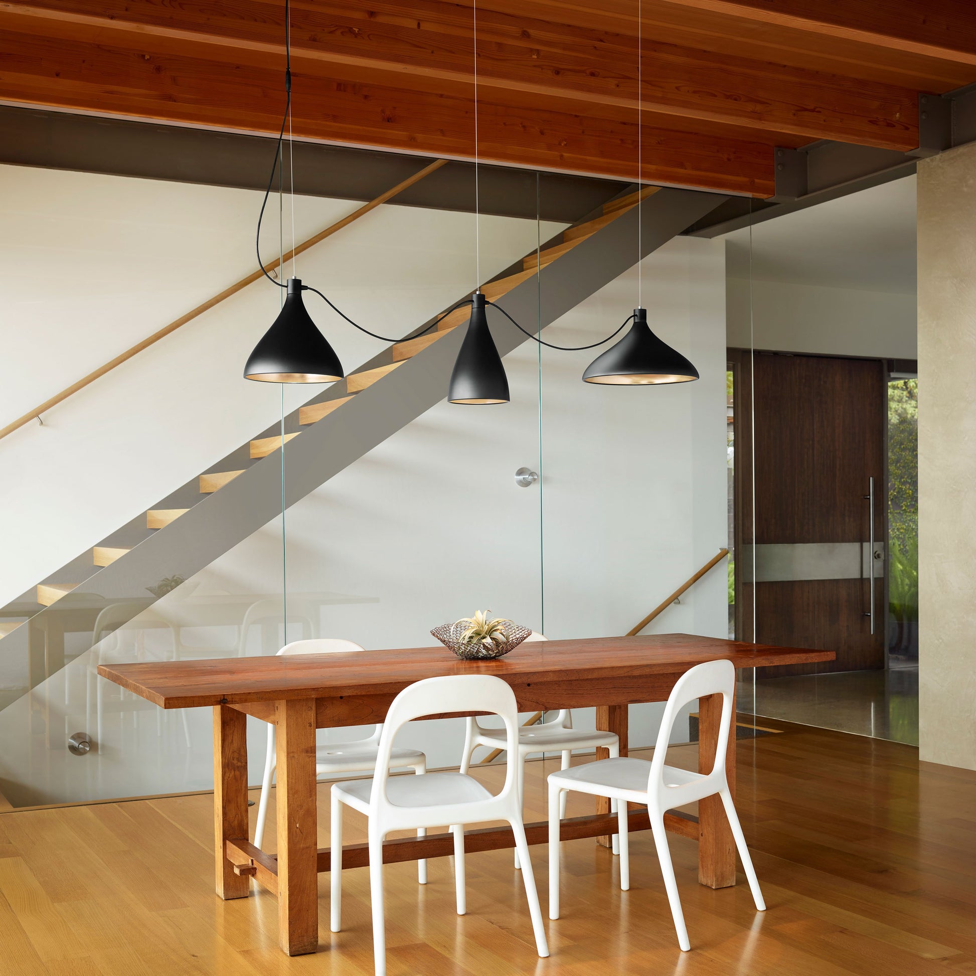 Swell LED String Pendant Light in dining room.