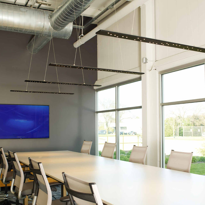 Parallax LED Linear Suspension Light in meeting room.