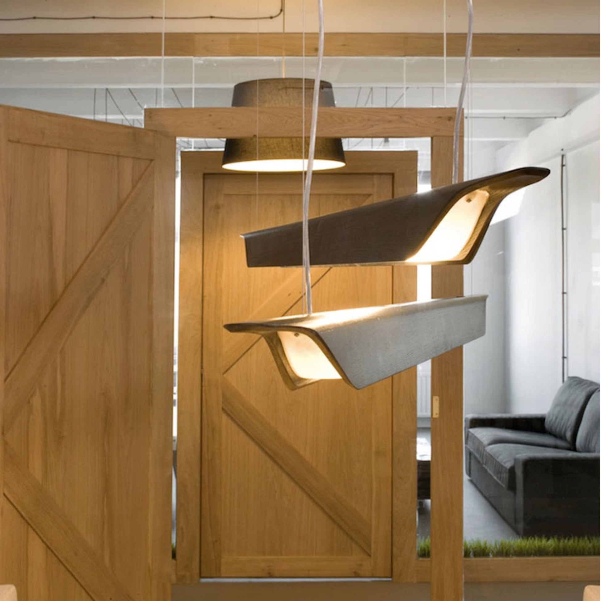 Troag Linear Suspension Light in living room.