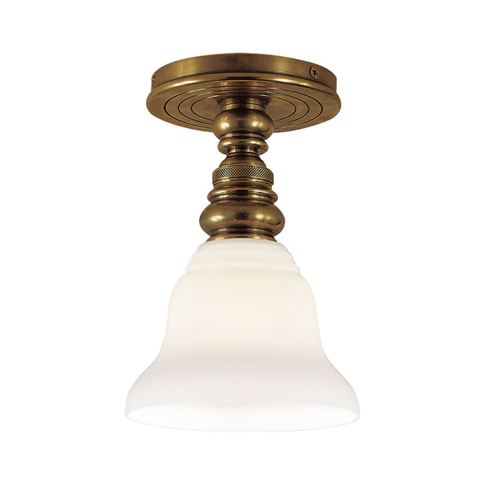 Boston Flush Mount Ceiling Light in Hand-Rubbed Antique Brass/White Glass Desk Shade.