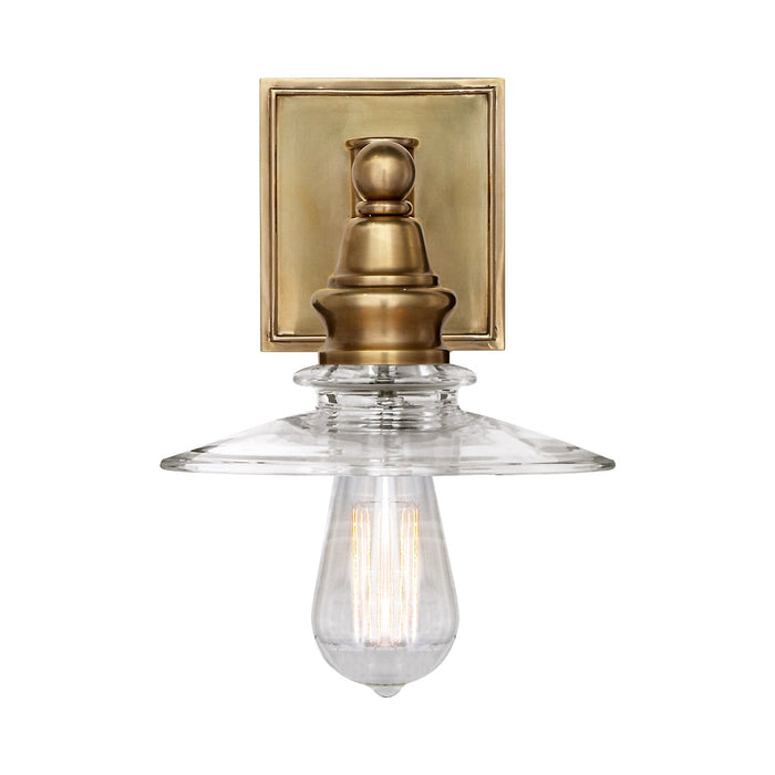 Covington Shield Wall Light in Antique-Burnished Brass.