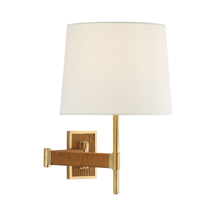 Elle LED Swing Arm Wall Light in Hand-Rubbed Antique Brass/Dark Rattan.