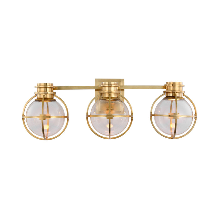 Gracie LED Triple Wall Light in Antique-Burnished Brass.