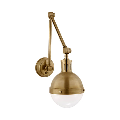 Hicks Adjustable Wall Light in Hand-Rubbed Antique Brass.