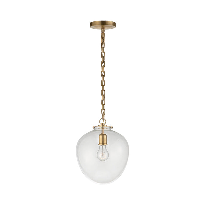 Katie Acorn Pendant Light in Hand-Rubbed Antique Brass/Clear Glass.