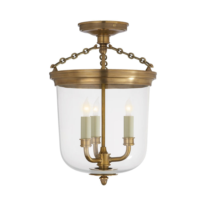 Merchant Semi Flush Mount Ceiling Light in Hand-Rubbed Antique Brass.