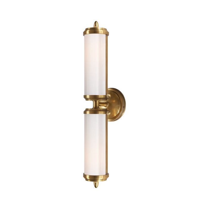 Merchant Vanity Wall Light in Hand-Rubbed Antique Brass.