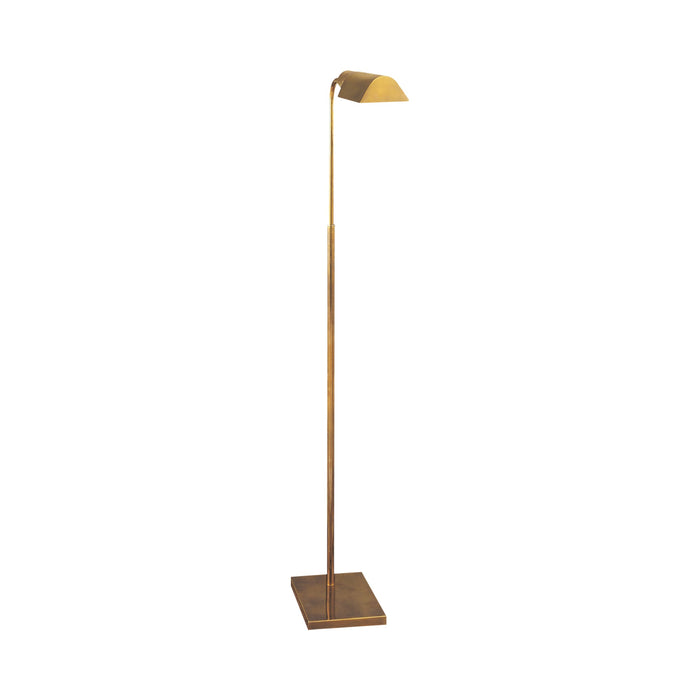 Studio Adjustable Floor Lamp in Hand-Rubbed Antique Brass.