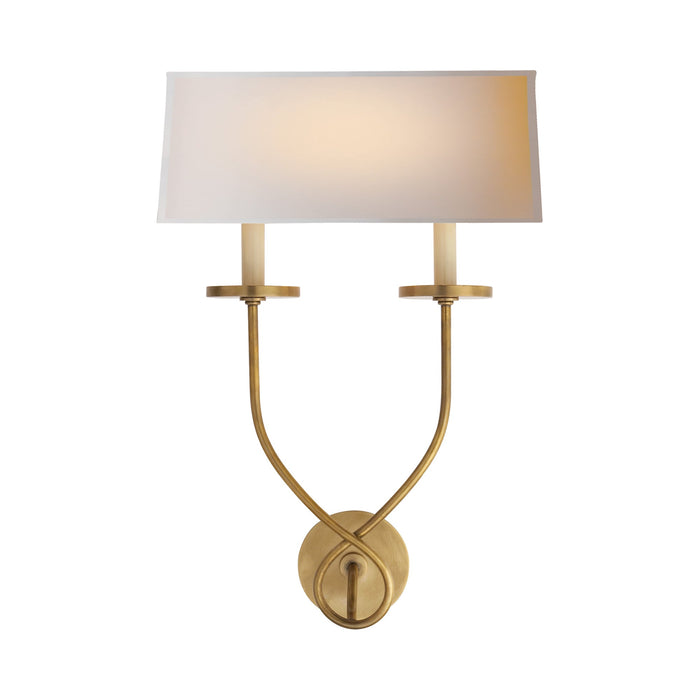 Symmetric Twist Double Wall Light in Antique-Burnished Brass.